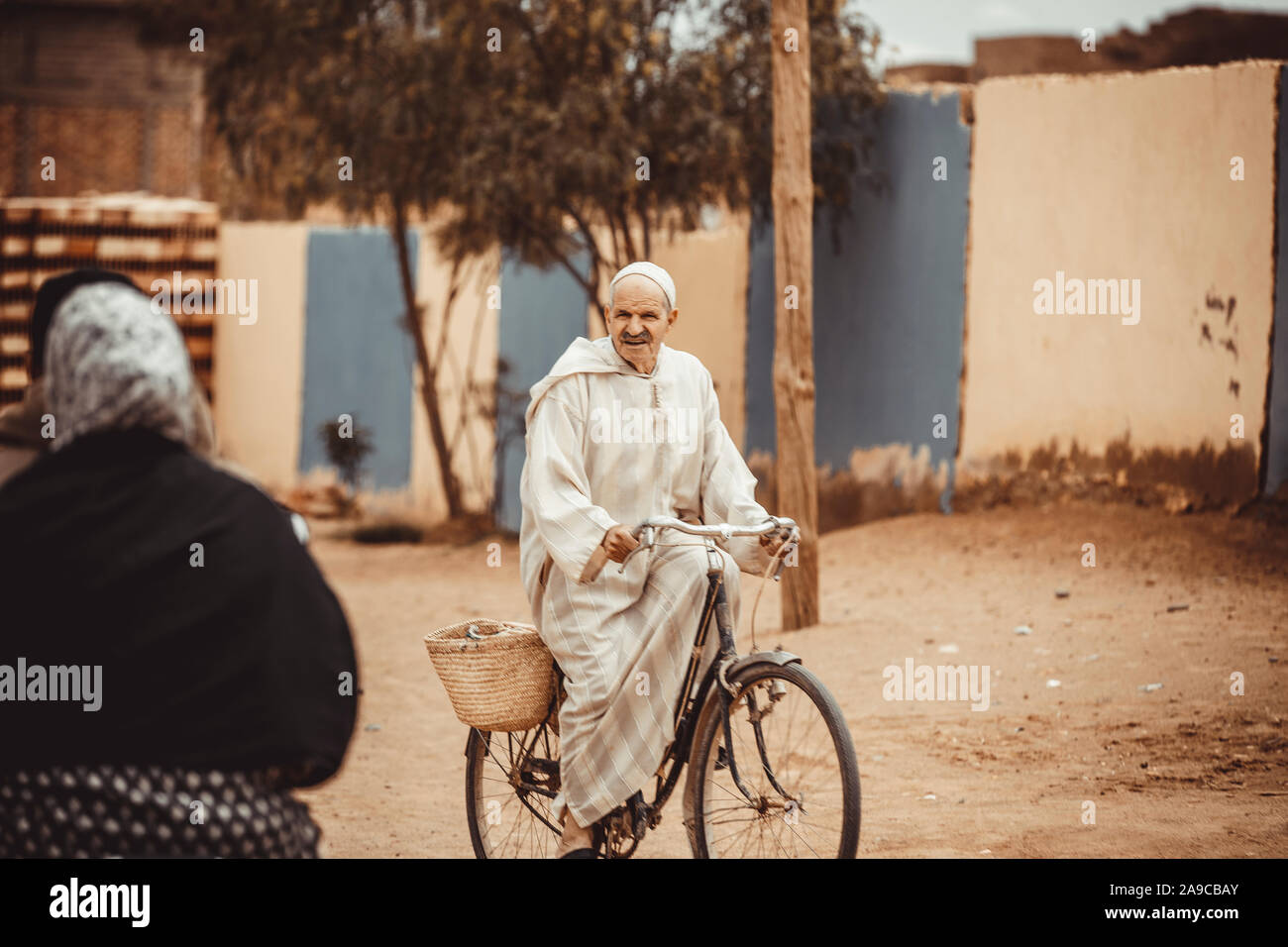 old man cycling on street Stock Photo Alamy