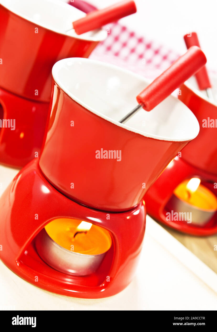 Utensils for making chocolate fondue Stock Photo Alamy