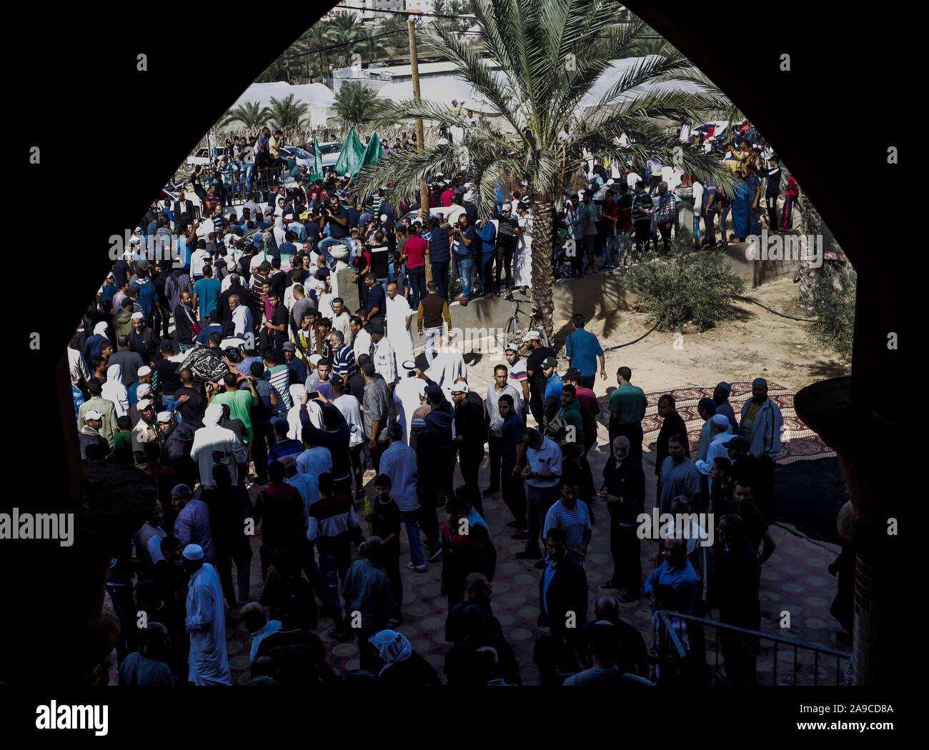 Crowd of Palestinian mourners during a funeral of Rasmi Abu Malhous and seven members of his family at a mosque in Deir al-Balah, central Gaza Strip. The deceased were killed in an overnight Israeli missile strike that targeted their house. Stock Photo