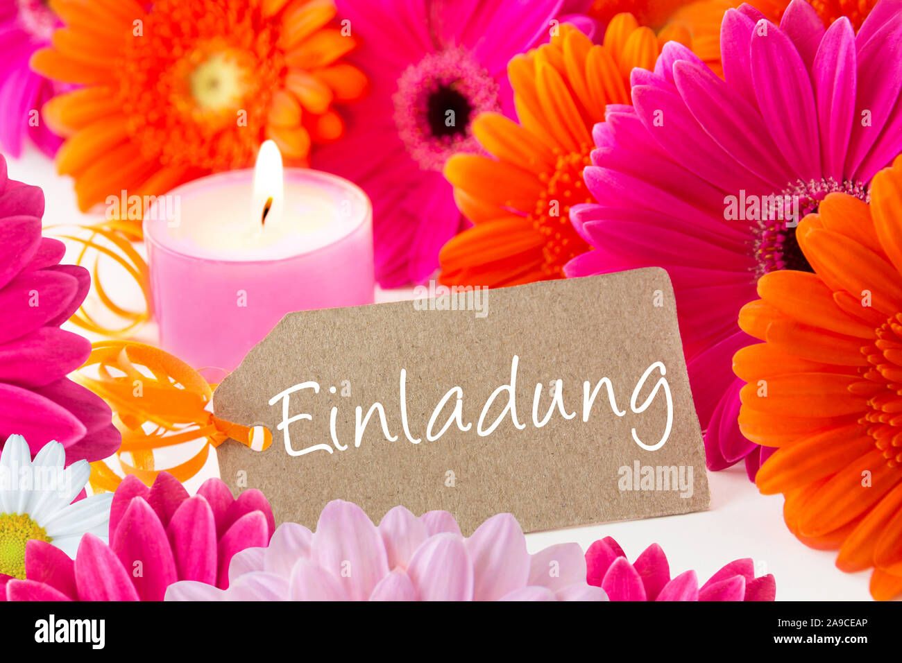 German invitation card and flowers with candles Stock Photo Alamy