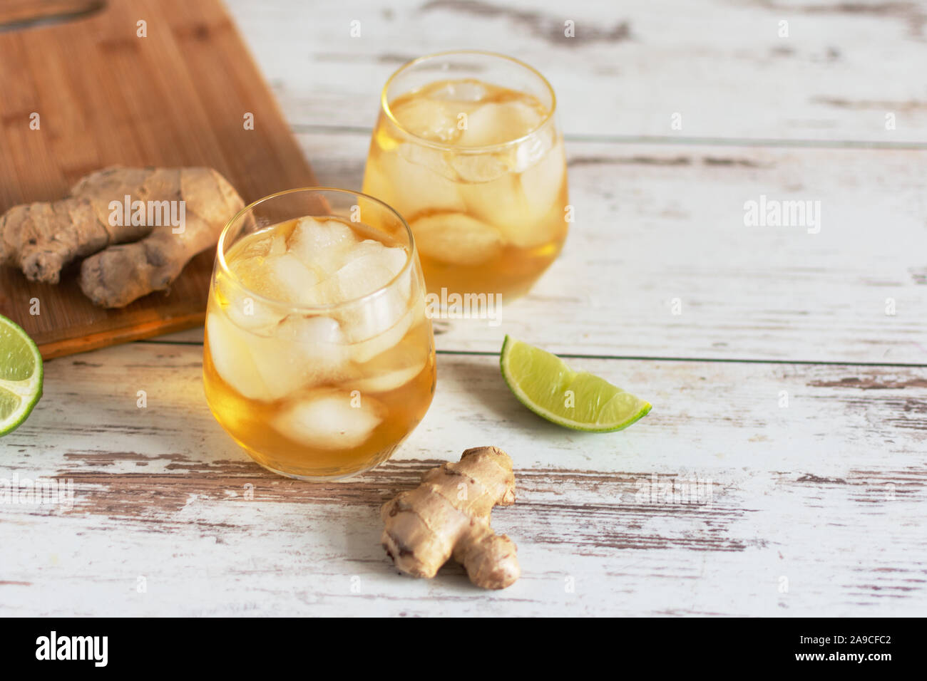 Fresh Ginger Ale with lime and ice or Kombucha in Bottle Homemade