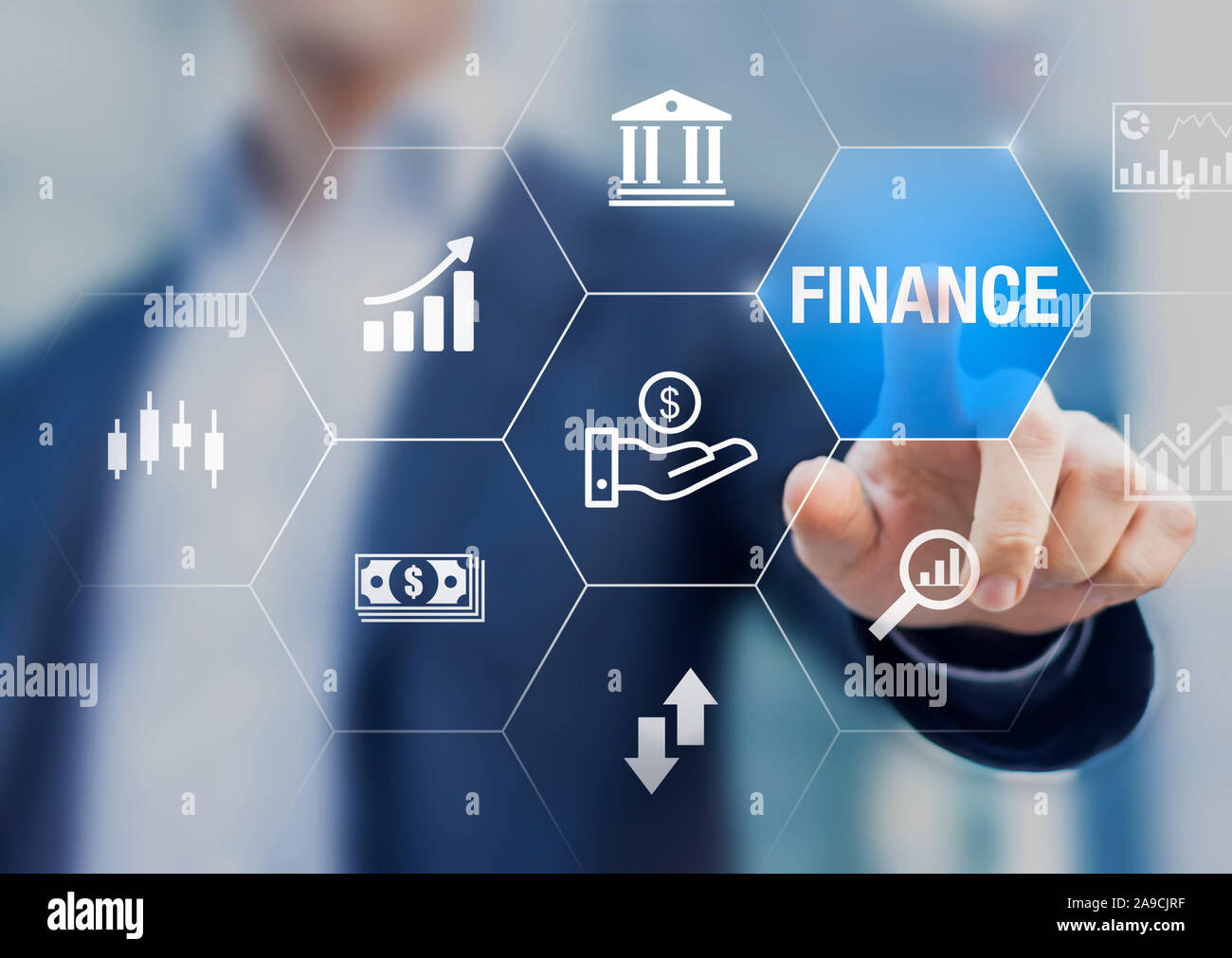 Finance investment and assets management concept with businessman touching icons of stock exchange market, bank, analysis, ROI, money and fintech Stock Photo