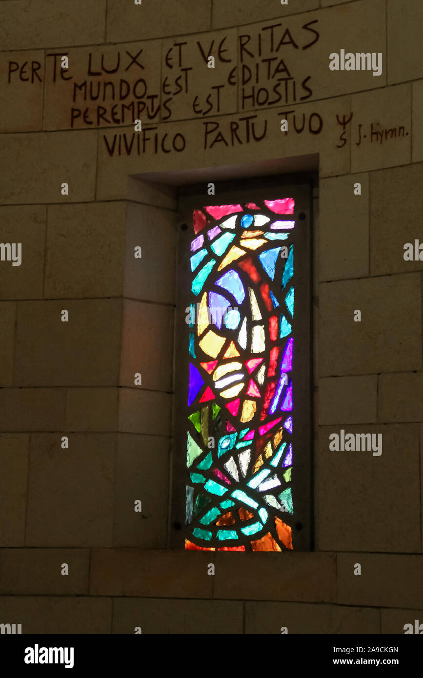 A stained glass window in the Catholic Church of the Annunciation. The largest Christian church building in the Middle East. Stock Photo