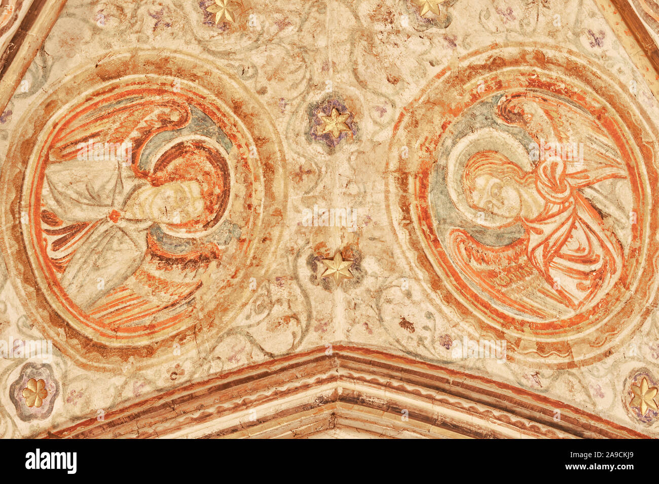 Thirteenth century ceiling paintings (of angels) in the guardian angels chapel at the english medieval cathedral at Winchester, England. Stock Photo