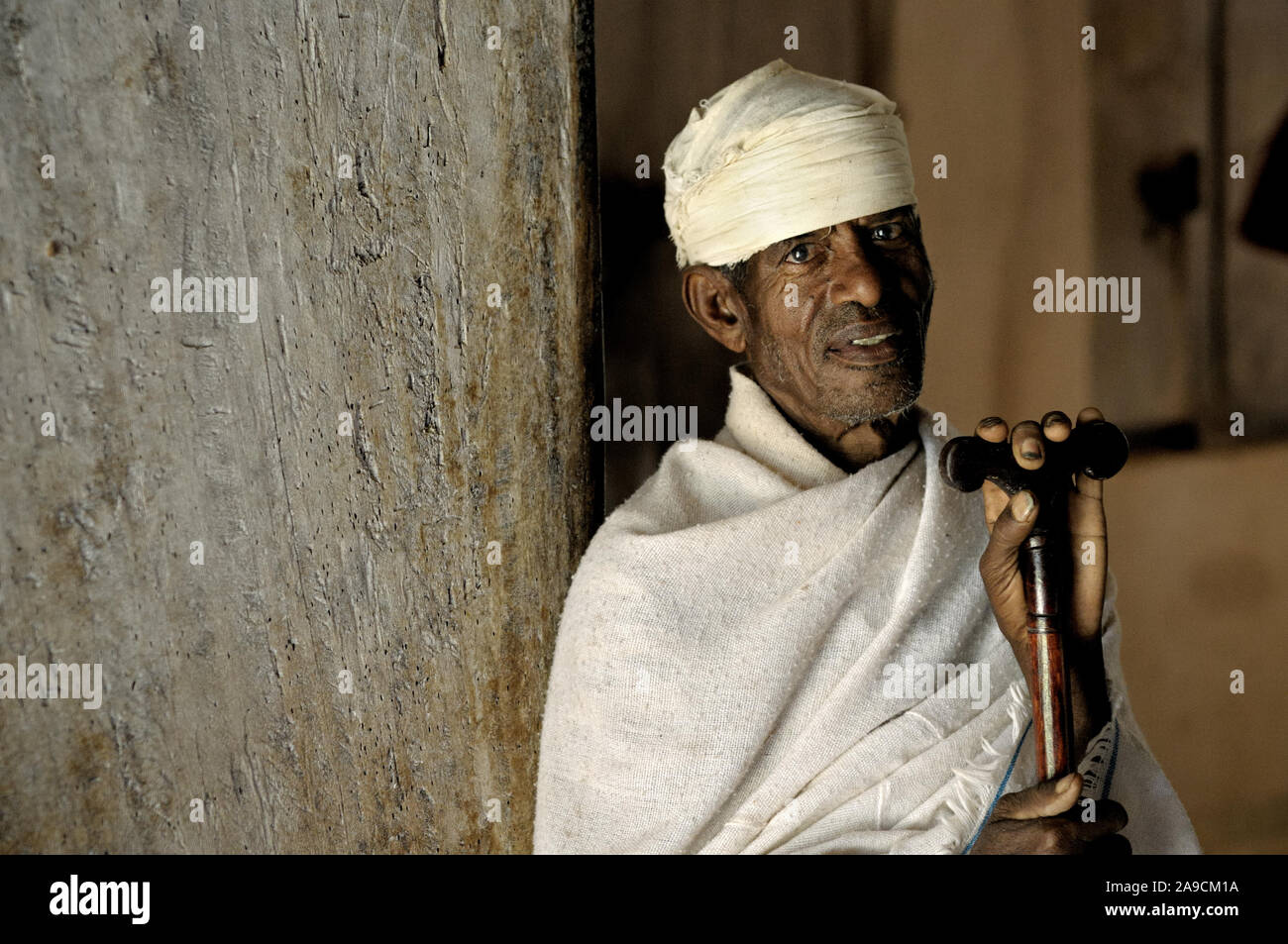 Priest with his prayer stick, Narga Selassie church, Lake Tana, Ethiopia Stock Photo
