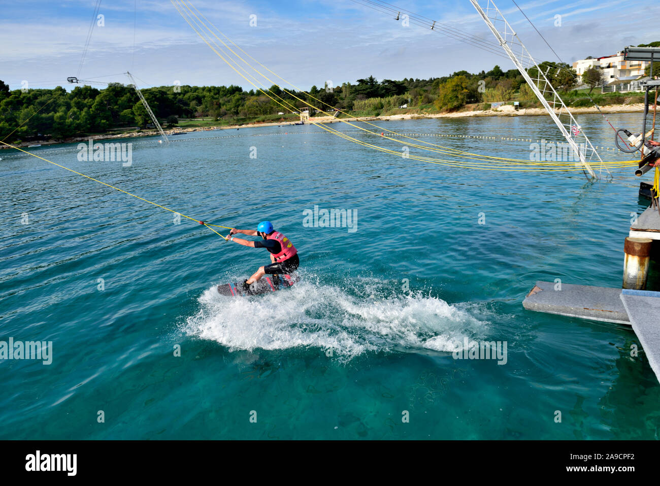 Cable wakeboarders waiting to start on Uvala valovine bay by Wake Park