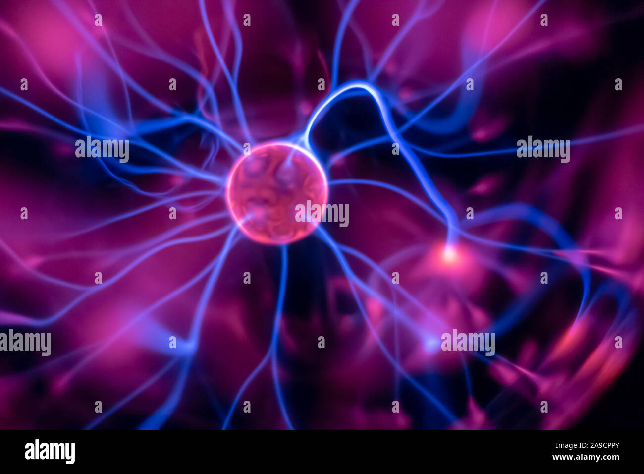 An image of a plasma lamp with moving light beams Stock Photo