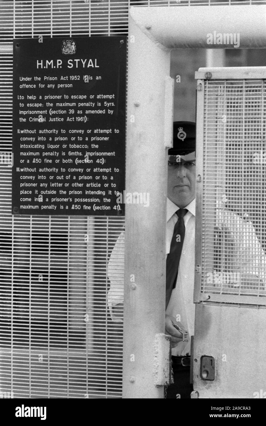 HM Prison Styal Wilmslow Cheshire 1980s. Womens prison Cheshire 1986 Male prison officer guard on gate duty at entrance to prison. UK HOMER SYKES Stock Photo