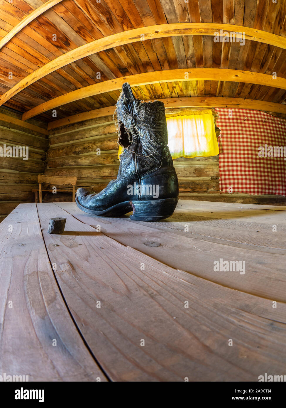 Boot inside one of the cabins at Raber Cow Camp, Lands End Road, Grand Mesa National Forest, Colorado. Stock Photo