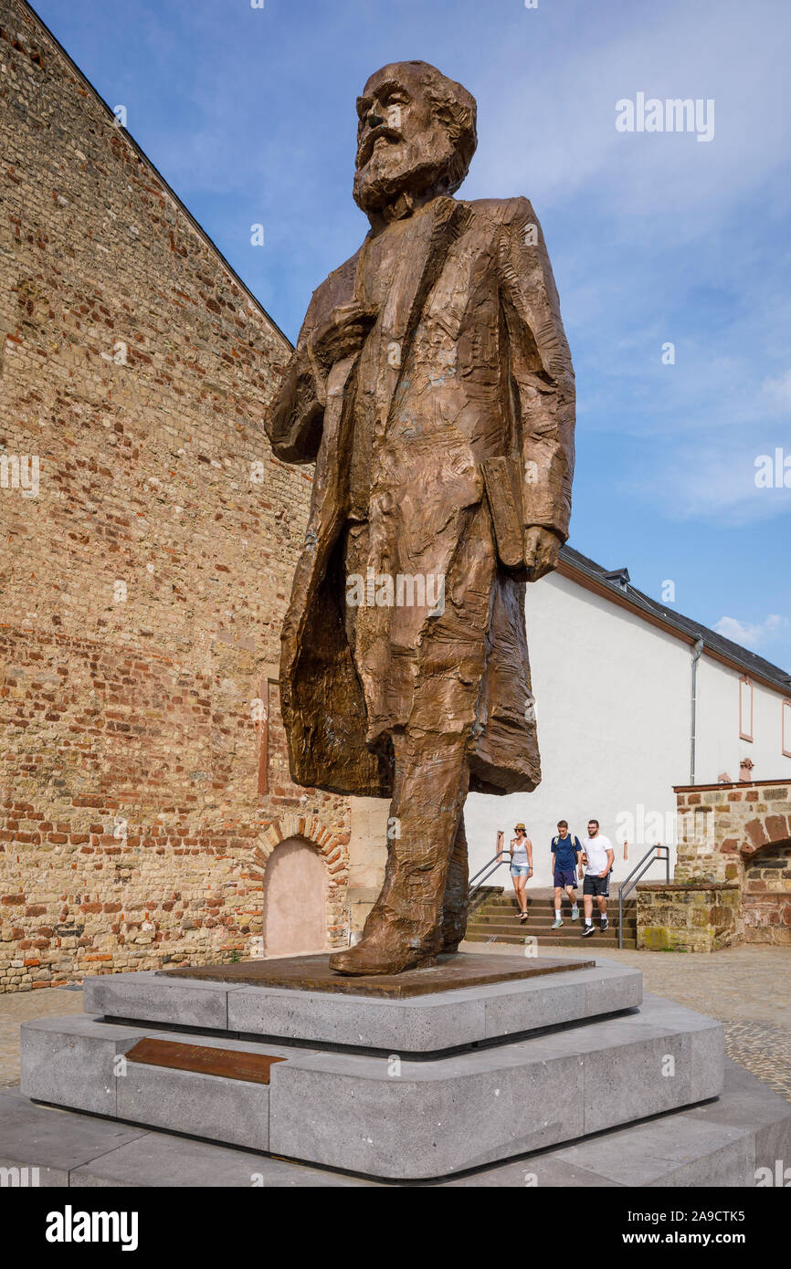 Karl Marx statue on the Simeonstiftplatz in Trier. The artwork of sculptor Wu Weishan is a gift from the People's Republic of China. Stock Photo