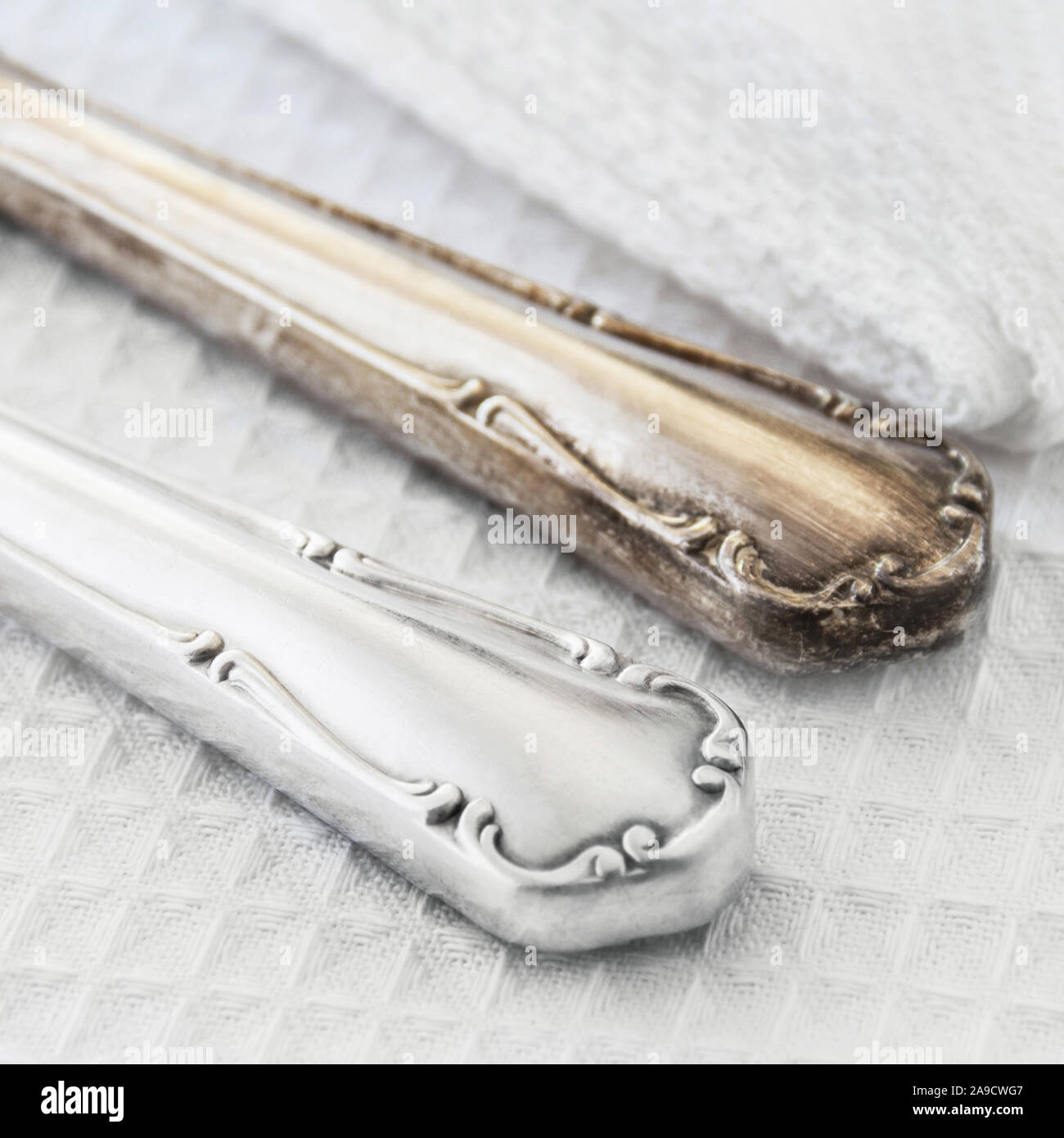 Cleaning tarnished silverware comparison Stock Photo Alamy