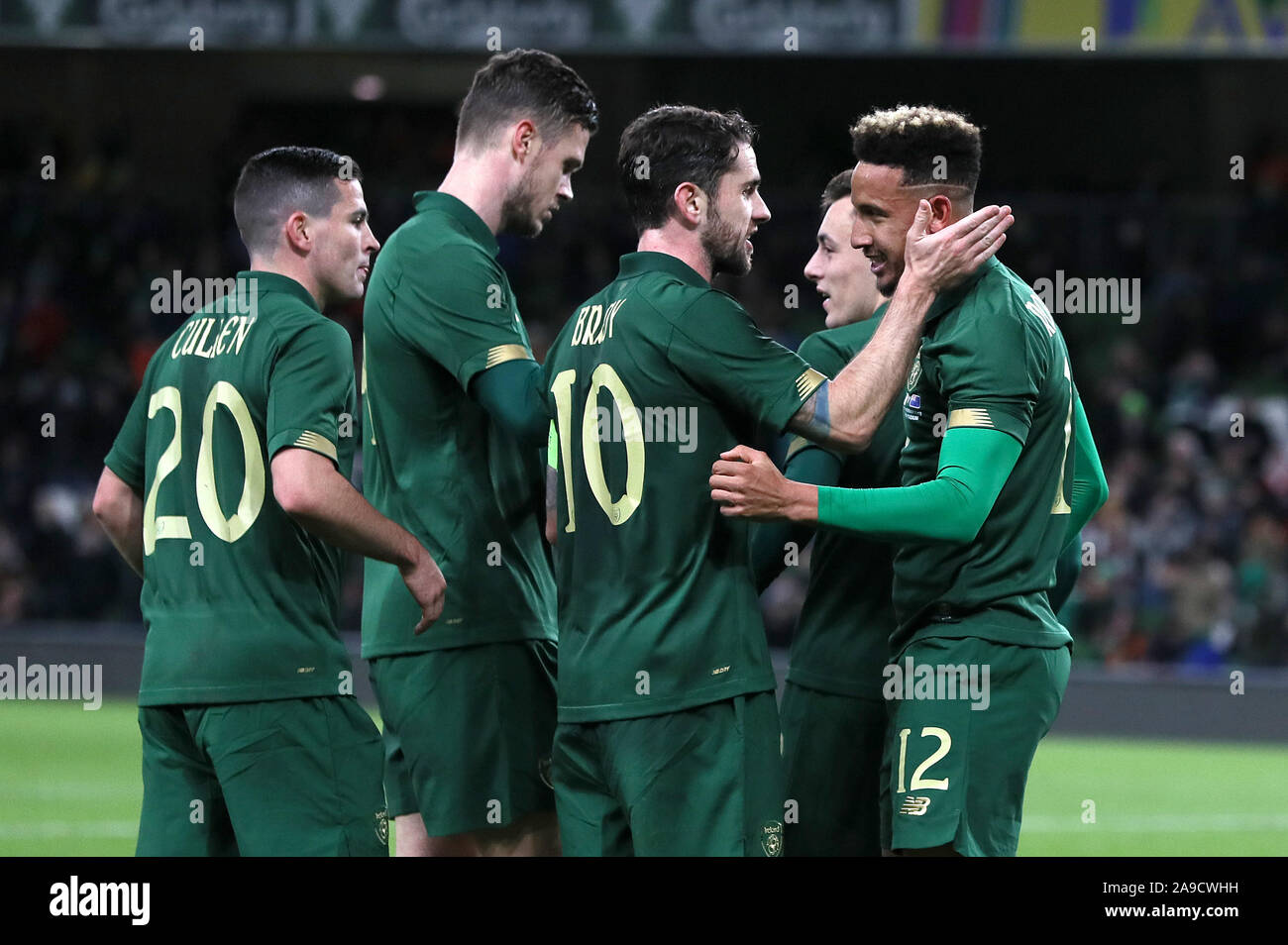 Republic of Ireland's Callum Robinson (right) celebrates scoring his ...