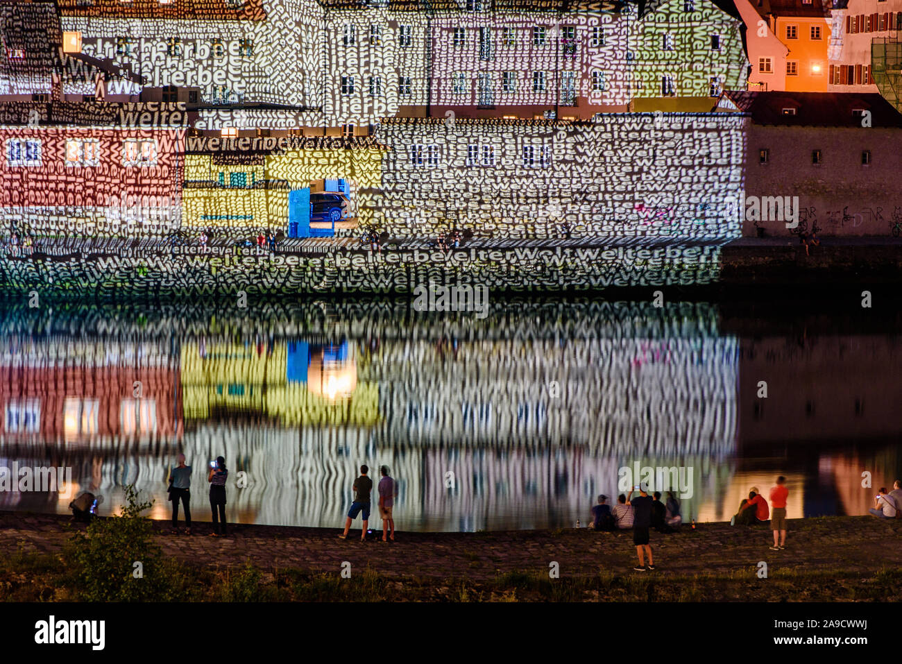 Old town of Regensburg in a very special light on 'Welterbetag' (World Heritage Day) Stock Photo