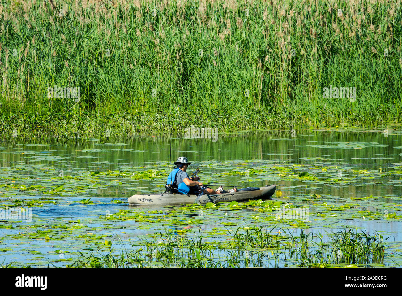 Recreational kayak and canoe boaters on the Au Sable River in the
