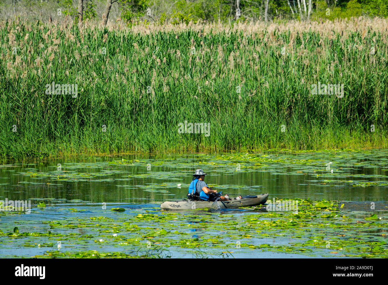 Recreational kayak and canoe boaters on the Au Sable River in the Pinery Provincial Park near