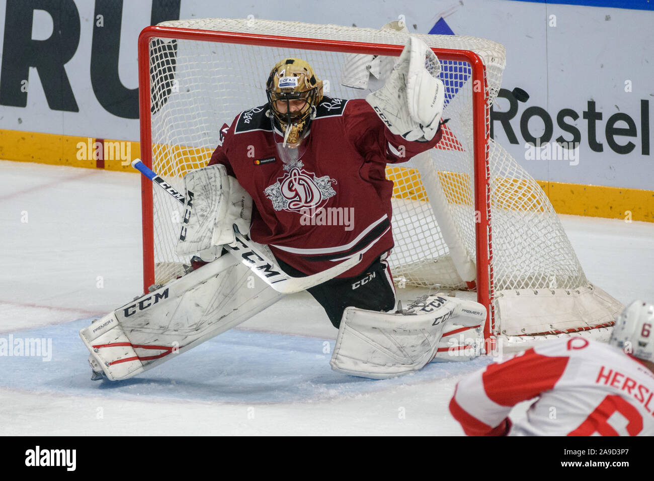 RIGA, Latvia. 14th Nov, 2019. Alexander Salak, goalkeeper of team Dinamo Riga, makes save, during Kontinental Hockey League (KHL) 2019/2020 season game, Dinamo Riga vs. Moscow Spartak Credit: Gints Ivuskans/Alamy Live News Stock Photo