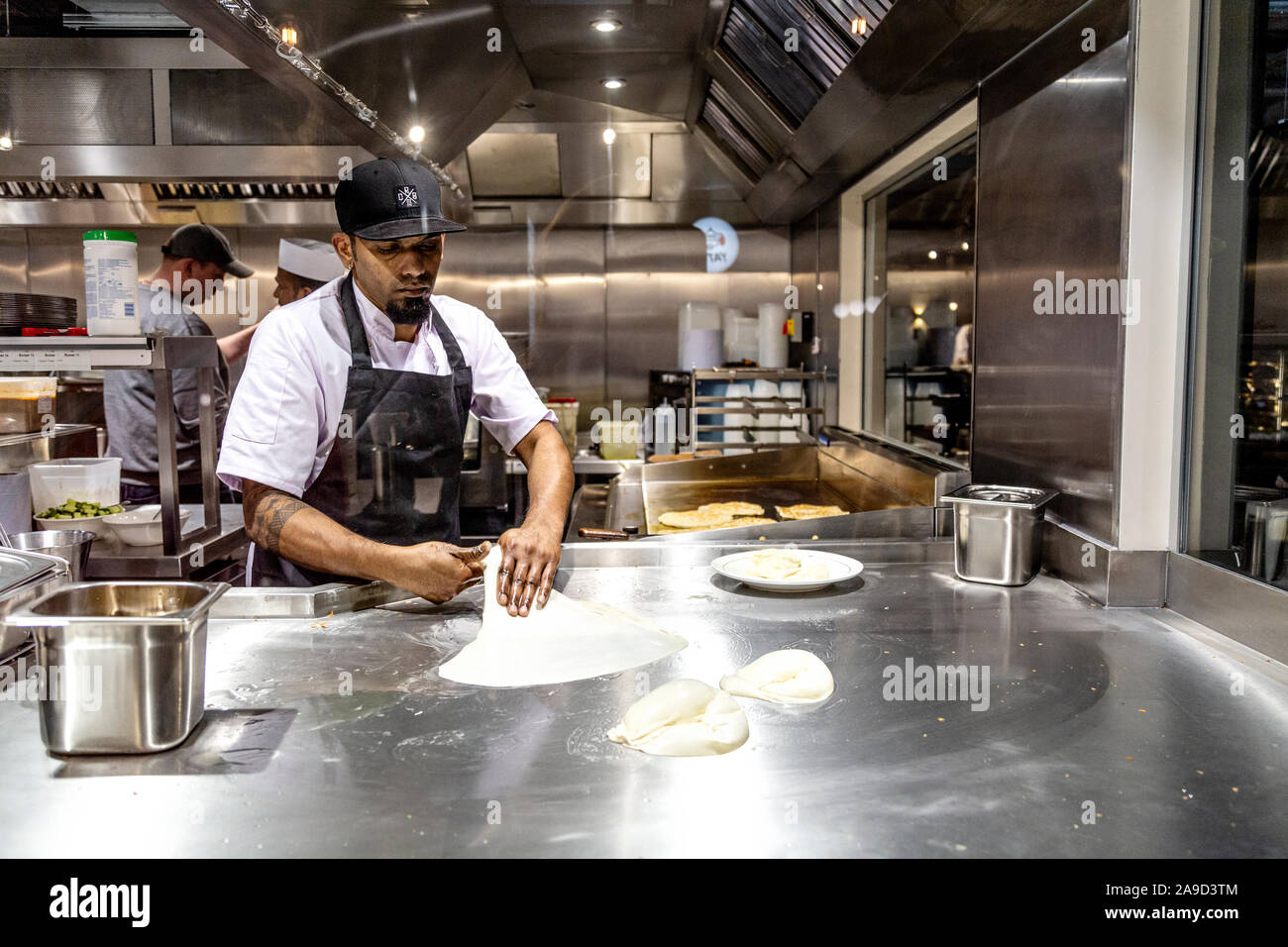 15th November 2019 - Opening of Market Hall West End, London, UK, chef making roti at Gopal's Corner Stock Photo