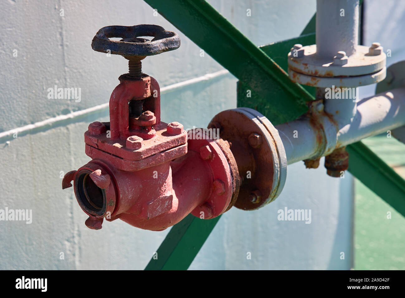 Fire valve for connecting a fire hose used to extinguish a fire on a tanker Stock Photo Alamy