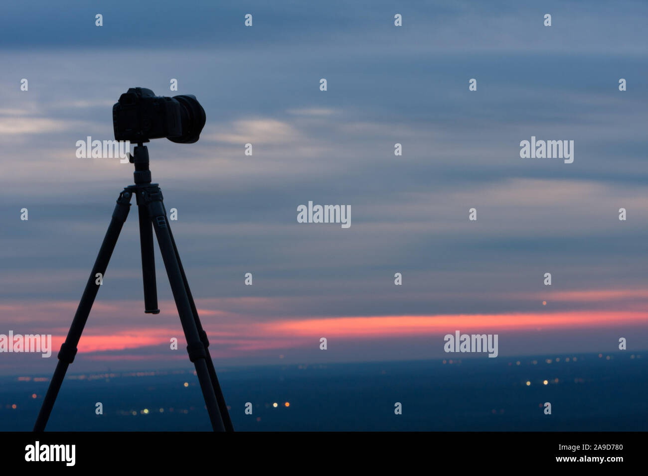 Silhouetted tripod hi-res stock photography and images - Alamy