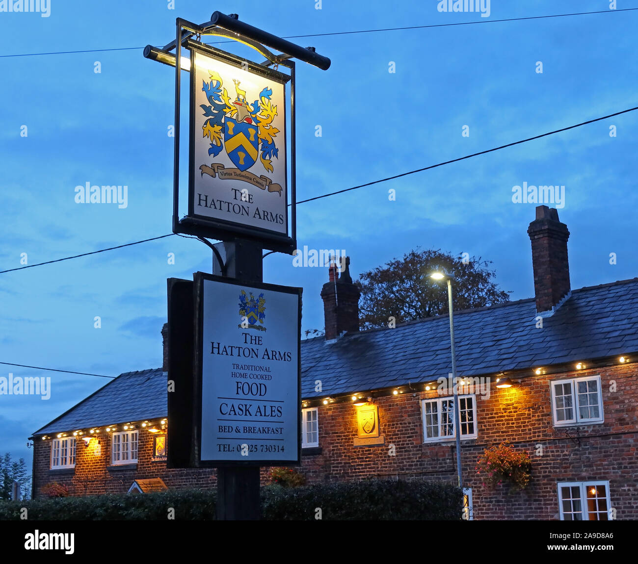 The Hatton Arms at dusk, Hatton Ln, Hatton, Warrington, Cheshire, North West England, UK, WA4 4DB Stock Photo