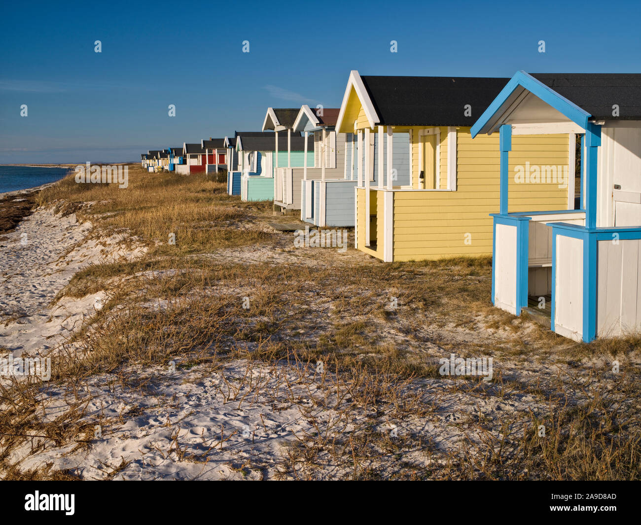 Sweden, Scania, Falsterbo peninsula, colourful beach huts near Skanör ...
