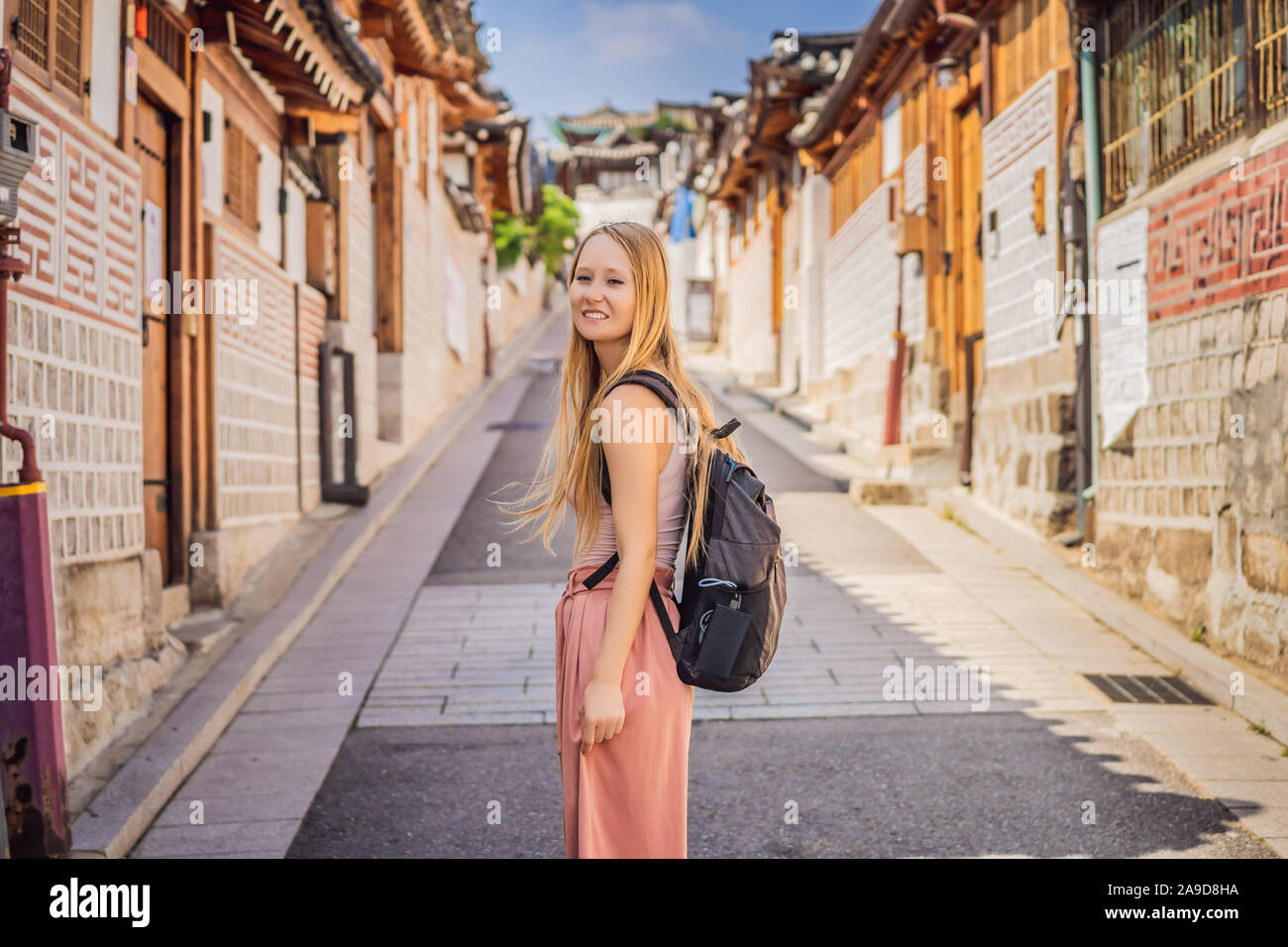 Young woman tourist in Bukchon Hanok Village is one of the famous place ...