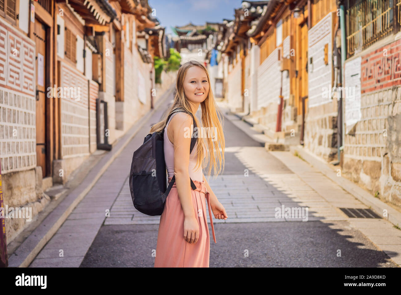 Young woman tourist in Bukchon Hanok Village is one of the famous place ...