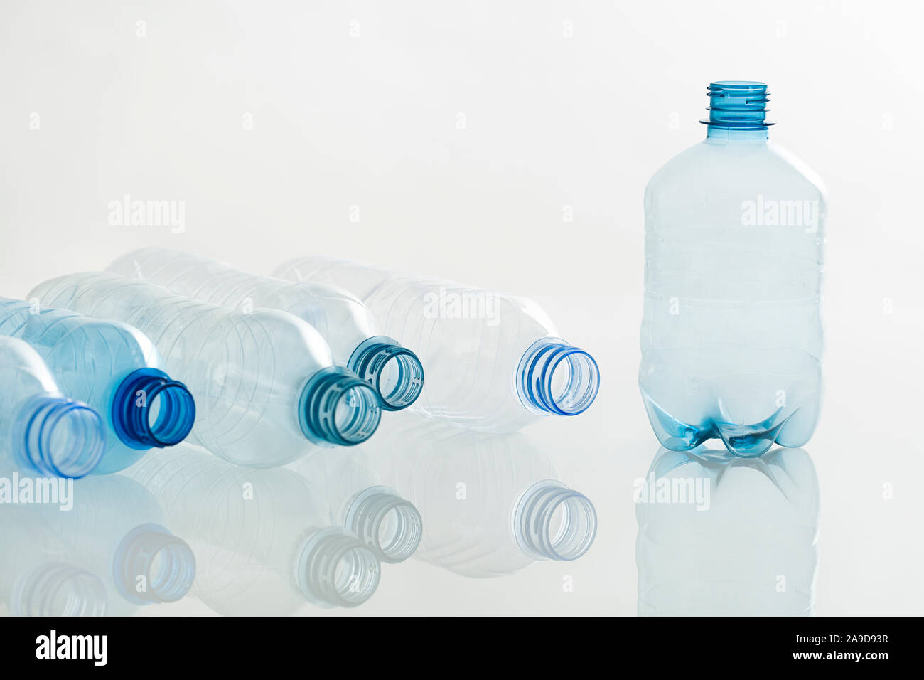 Bottles, PET, empty, lying, standing, reflection Stock Photo