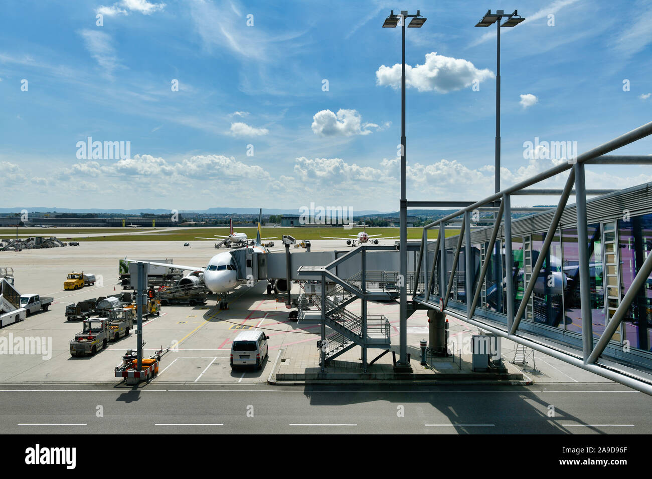 Baggage handling and catering at the gate, terminal of Stuttgart