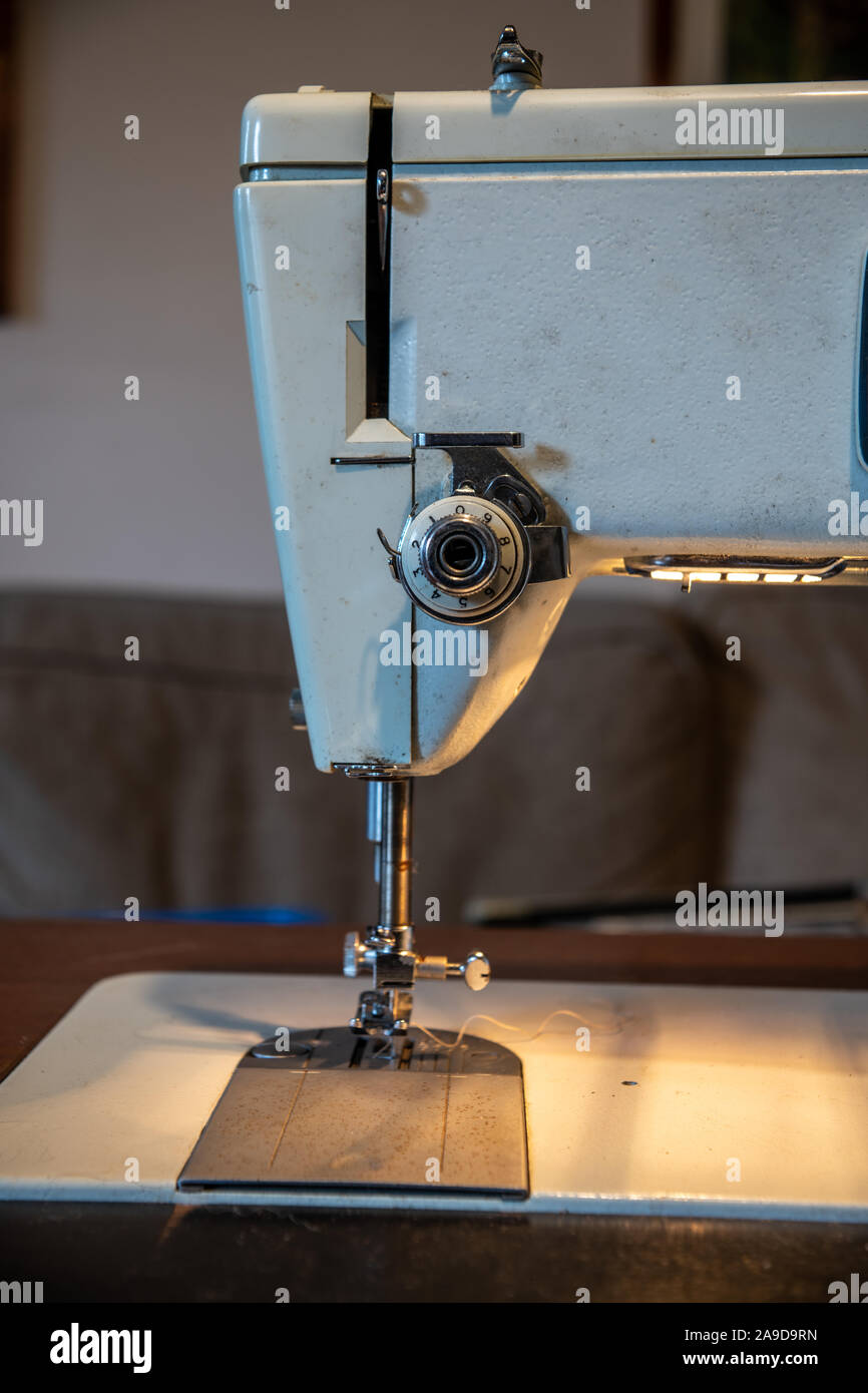 Sewing machine arm and needle from the front Stock Photo Alamy