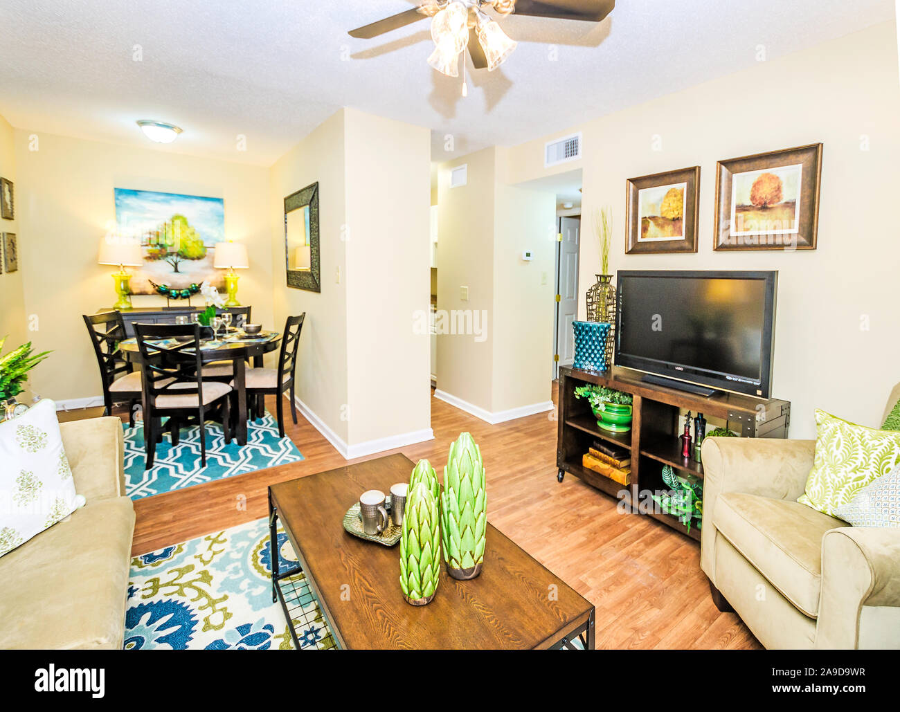 The Dining Room And Living Room Showcase The Open Floor Plan At