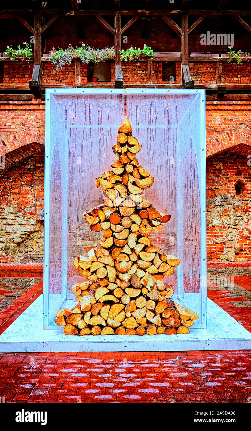 Christmas tree made of the fire wood new Stock Photo - Alamy