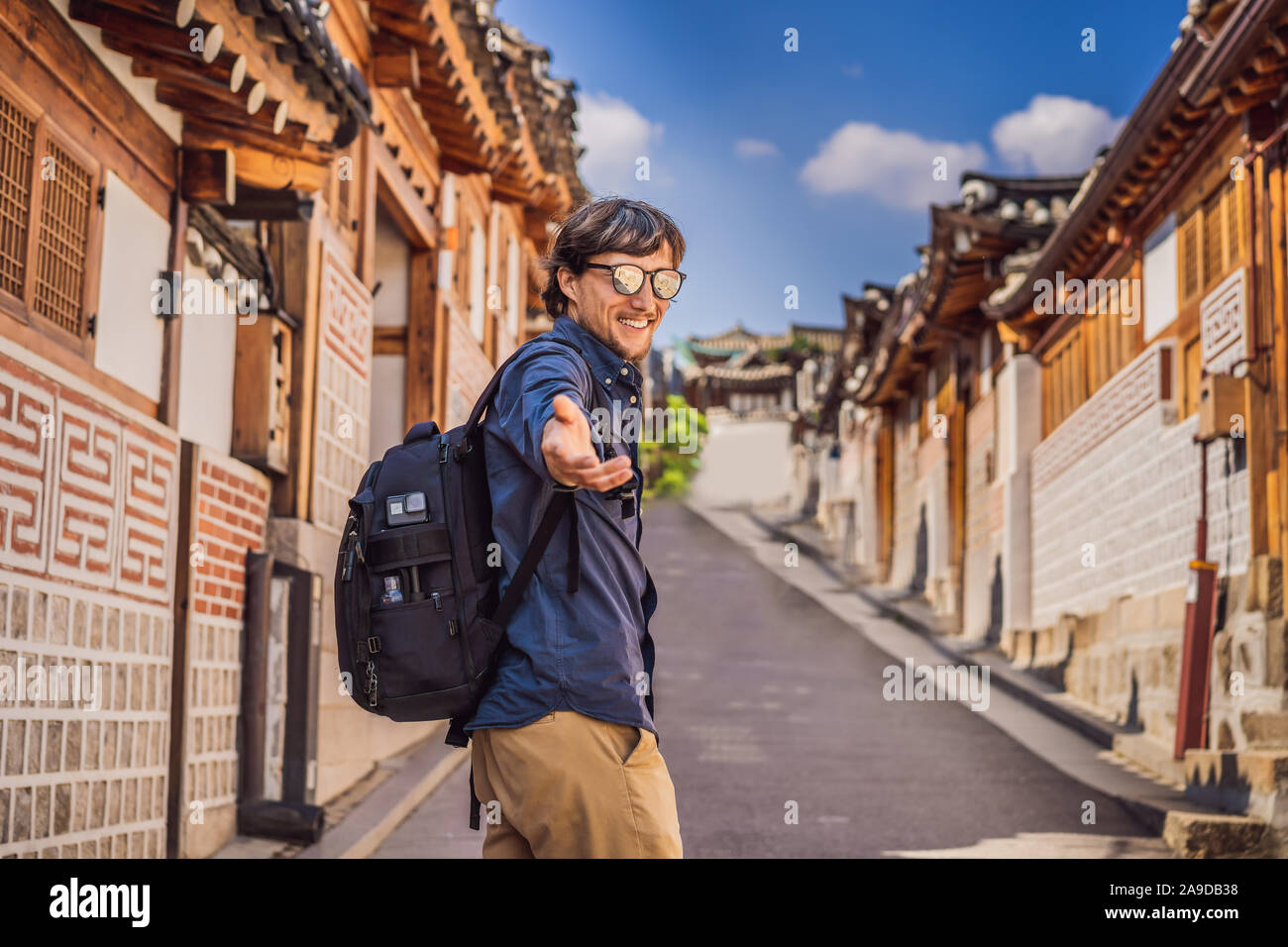 Young man tourist in Bukchon Hanok Village is one of the famous place ...