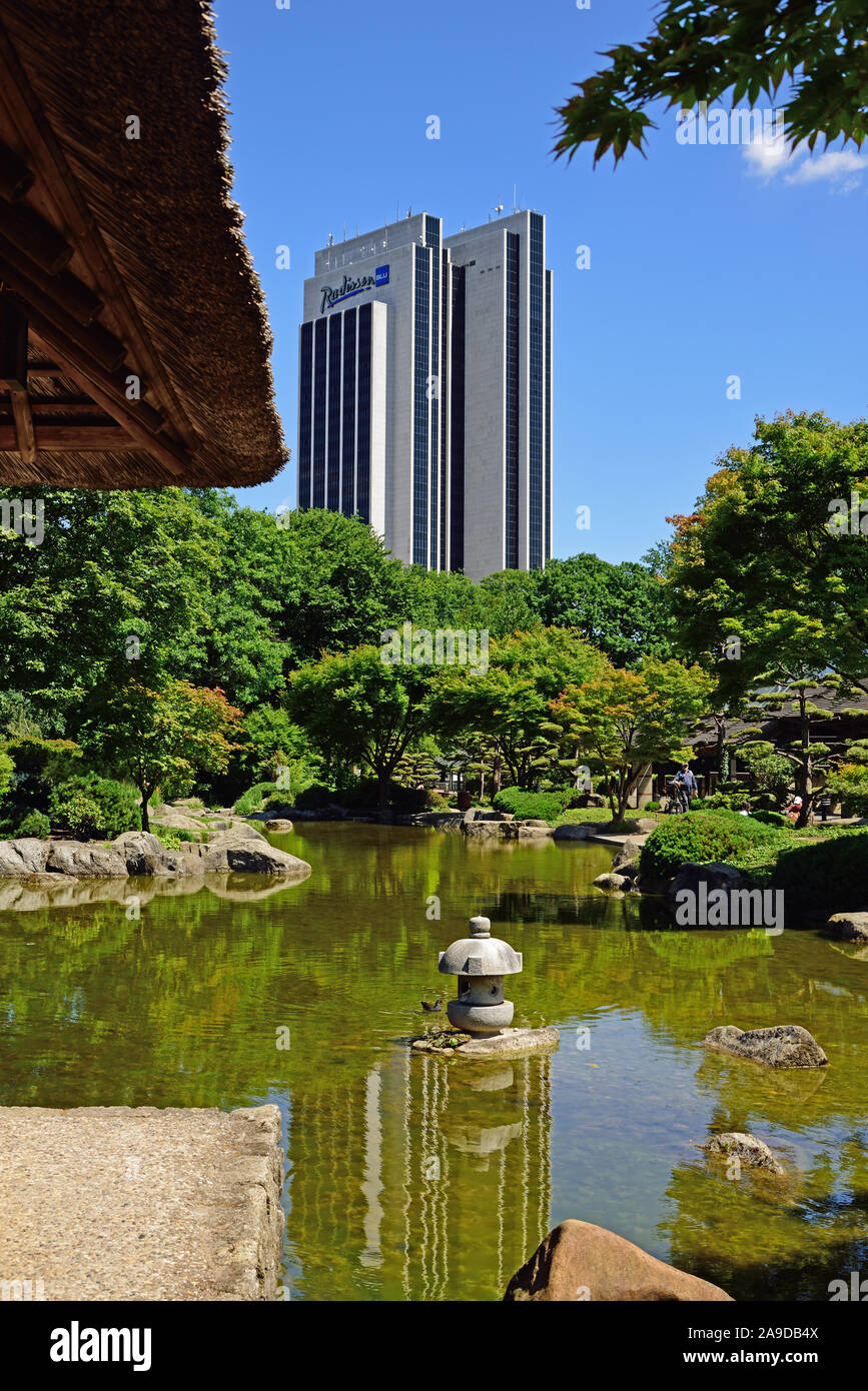 Europe, Germany, Hamburg Metropolitan Region, St. Pauli, Planten un Blomen  Park, Japanese Garden and Hotel Radisson BLU Stock Photo - Alamy