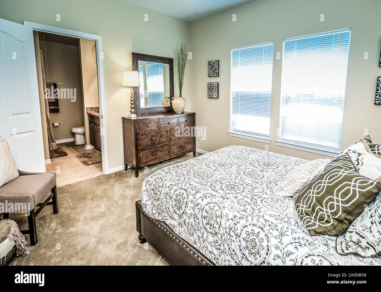 A Master Bedroom With Master Bathroom Is Pictured At Cypress