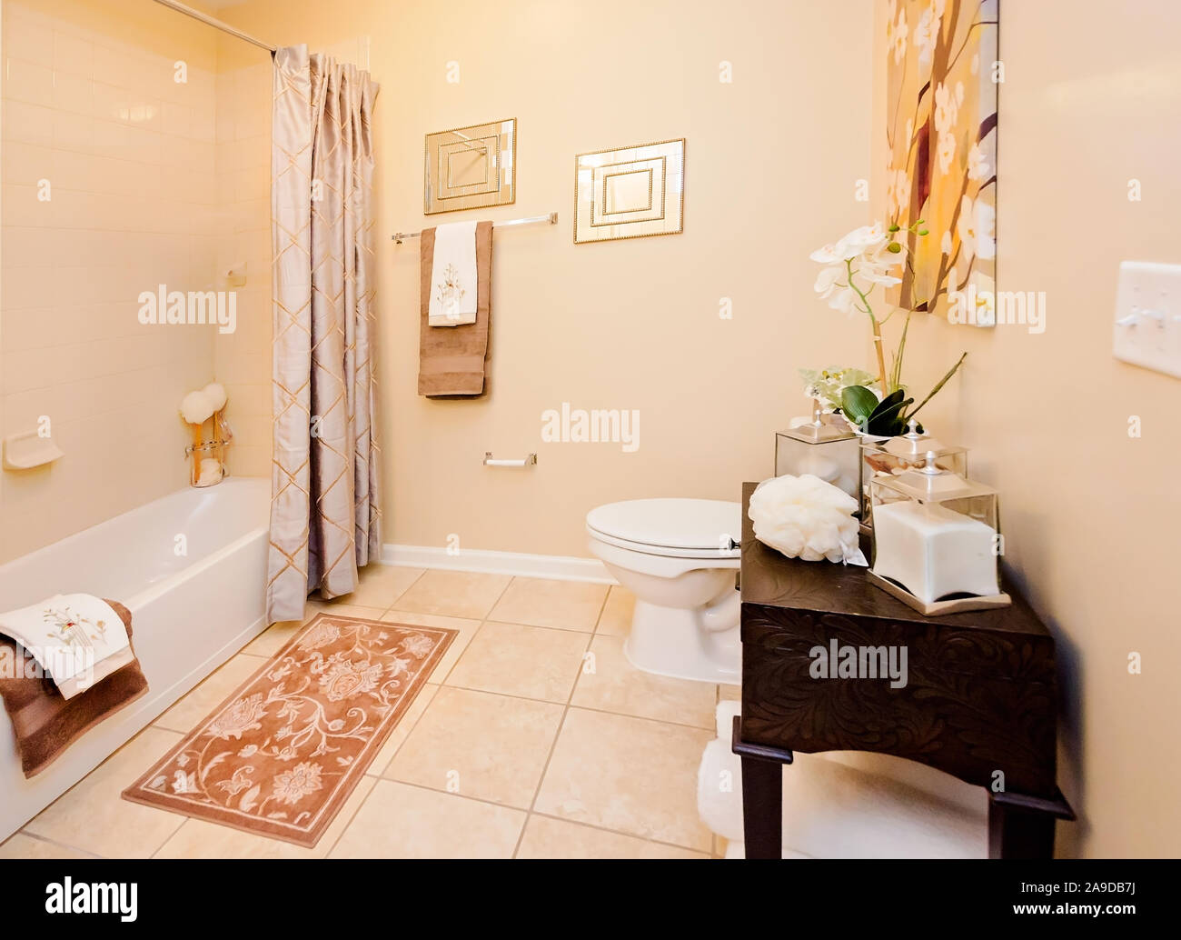 A bathroom sink and bathtub are pictured at Cypress Cove Apartment