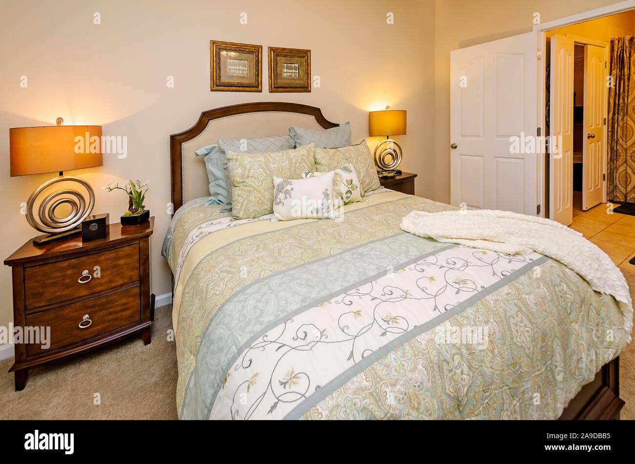 A master bedroom with master bathroom is pictured at Cypress Cove