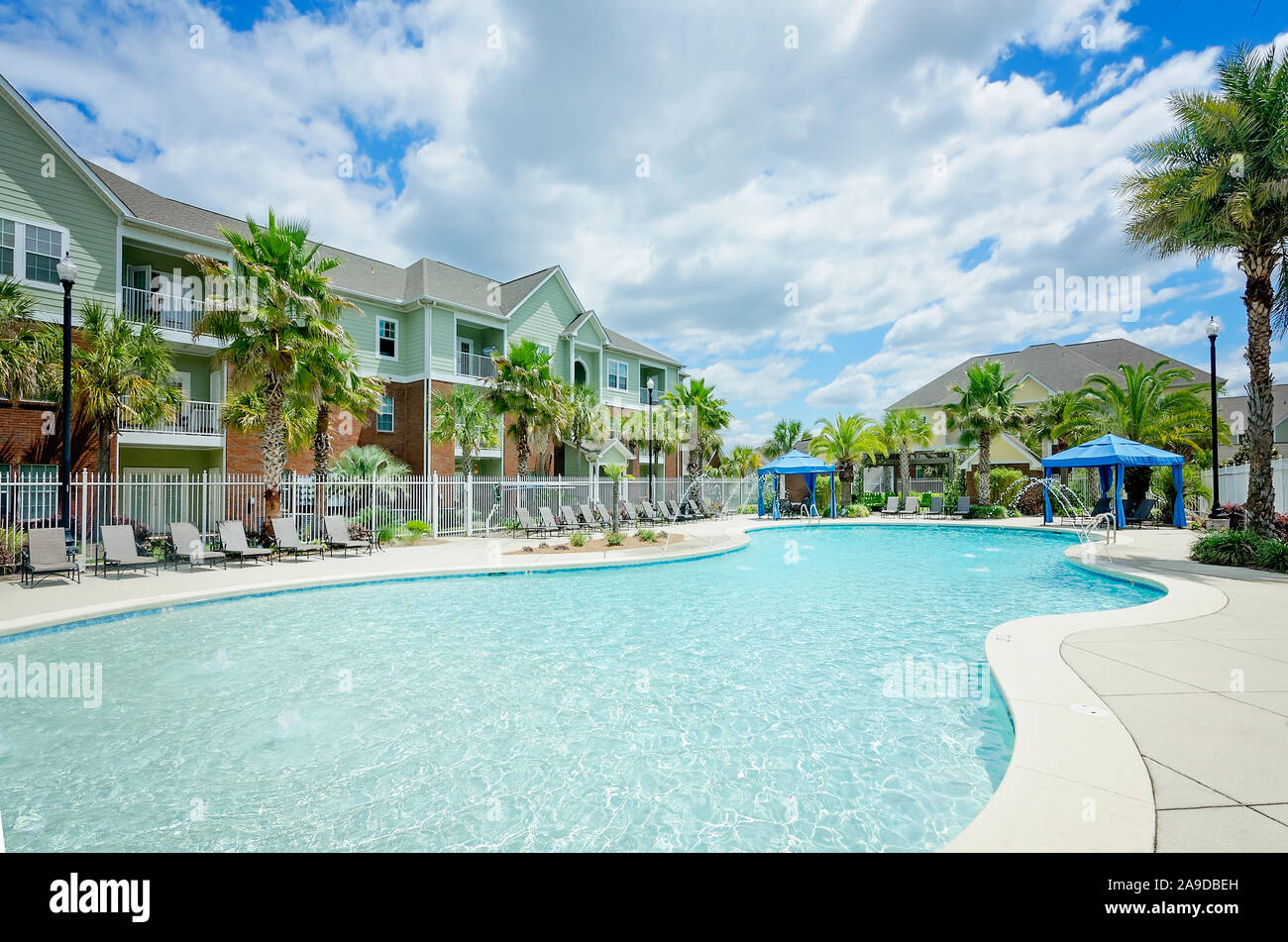 A large, curvy builtin zero entry swimming pool is a focal point for residents at Cypress Cove