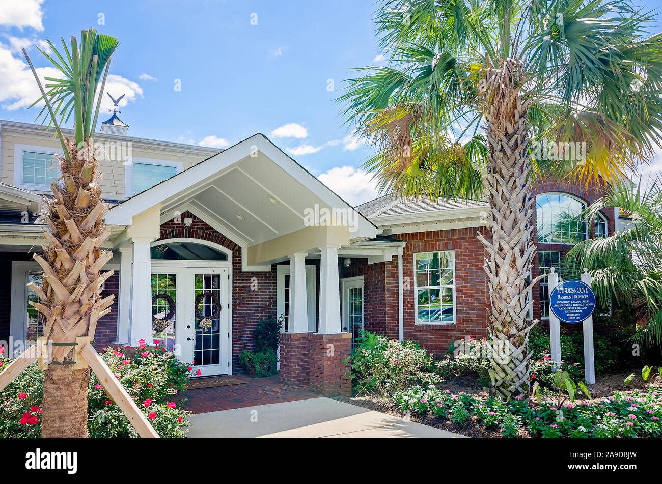 The leasing office is pictured at Cypress Cove Apartment Homes in Mobile, Alabama. The apartment complex is owned and operated by Sealy Management. Stock Photo