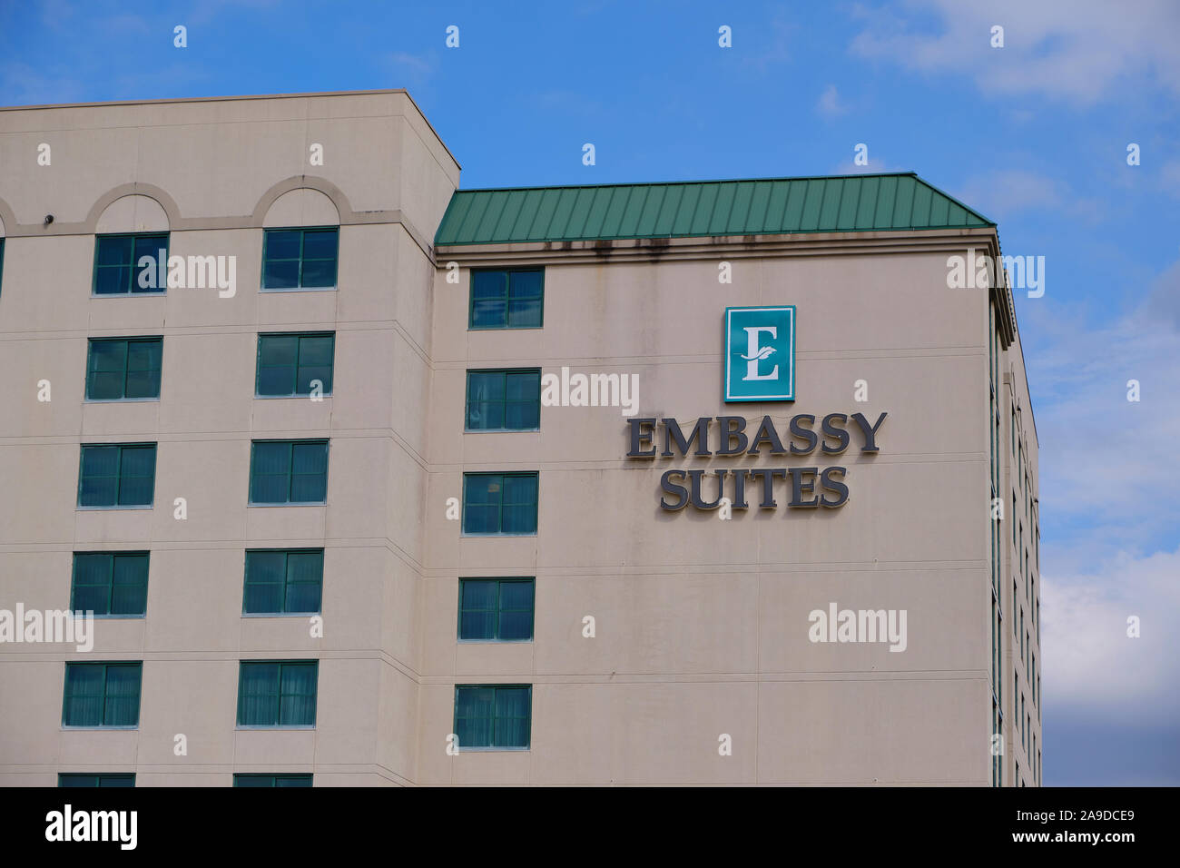 Exterior Embassy Suites hotel sign in Montgomery Alabama, USA. Stock Photo