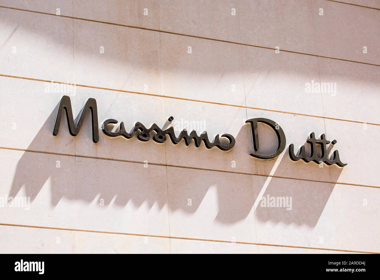Benidorm, Spain - April 13th 2019: The logo above the entrance to a Massimo  Dutti clothing store in Benidorm, Spain Stock Photo - Alamy