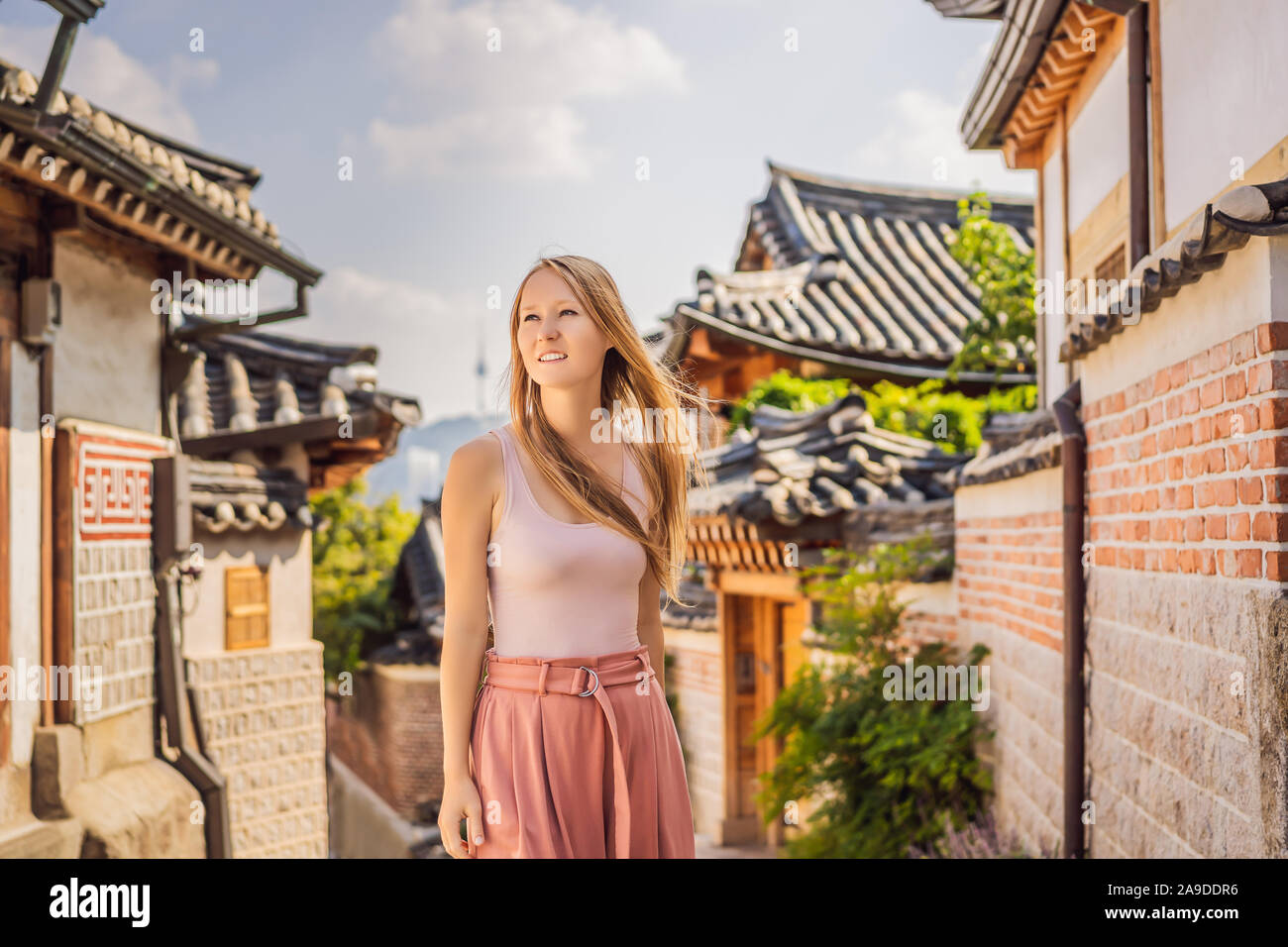 Young woman tourist in Bukchon Hanok Village is one of the famous place ...