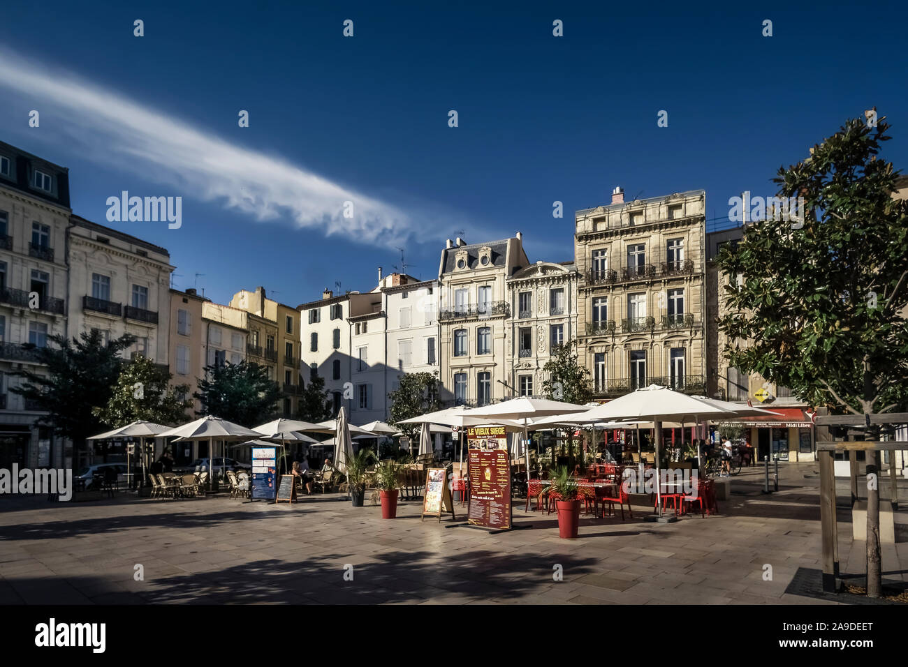 Cafes at the Place des Trois Six in Béziers in summer Stock Photo