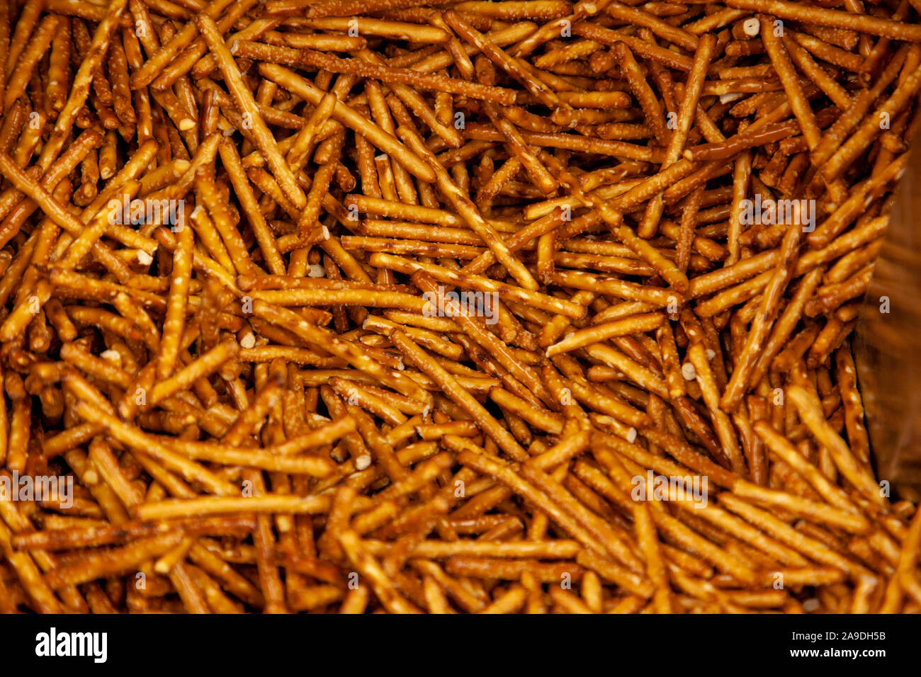 salt coated delicious looking snack sticks made of pretzels Stock Photo