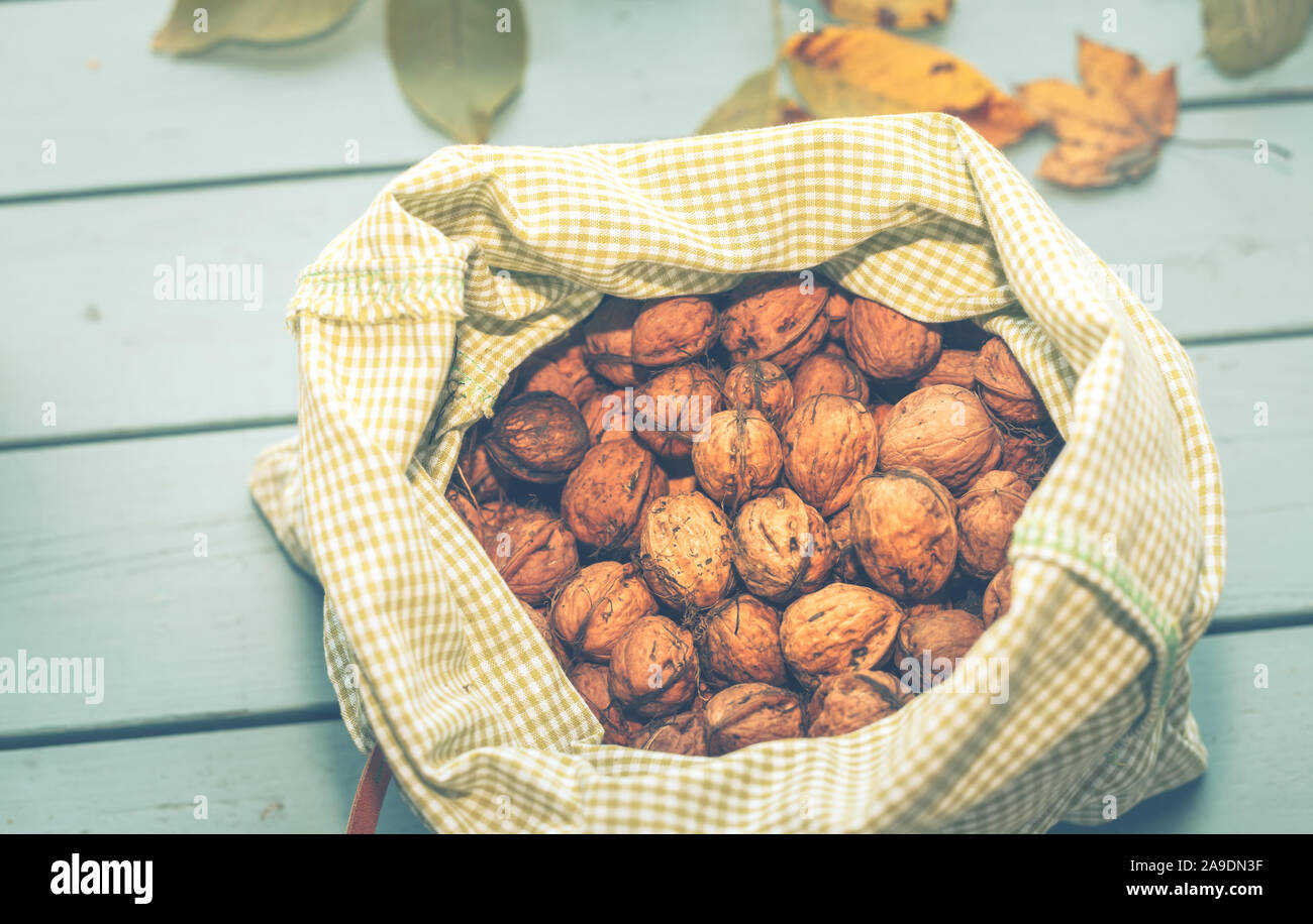 Harvest time - walnuts (Juglans regia) lying out to dry in the sun Stock Photo