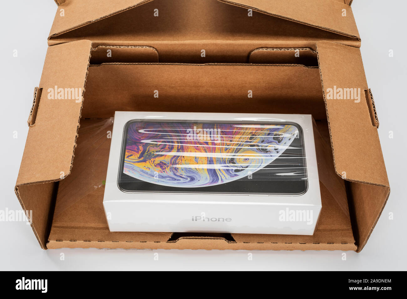 Apple iPhone XS Max in shipping box, opened, Stock Photo