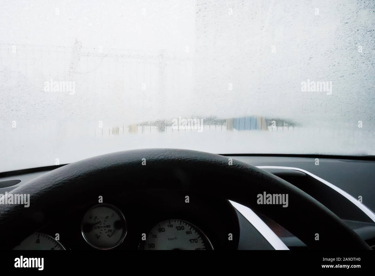 Close up footage of a car windshield, frost on the windshield of the car.  View from the driver's side. a frozen car windshield. defrost, defroster in  Stock Photo - Alamy