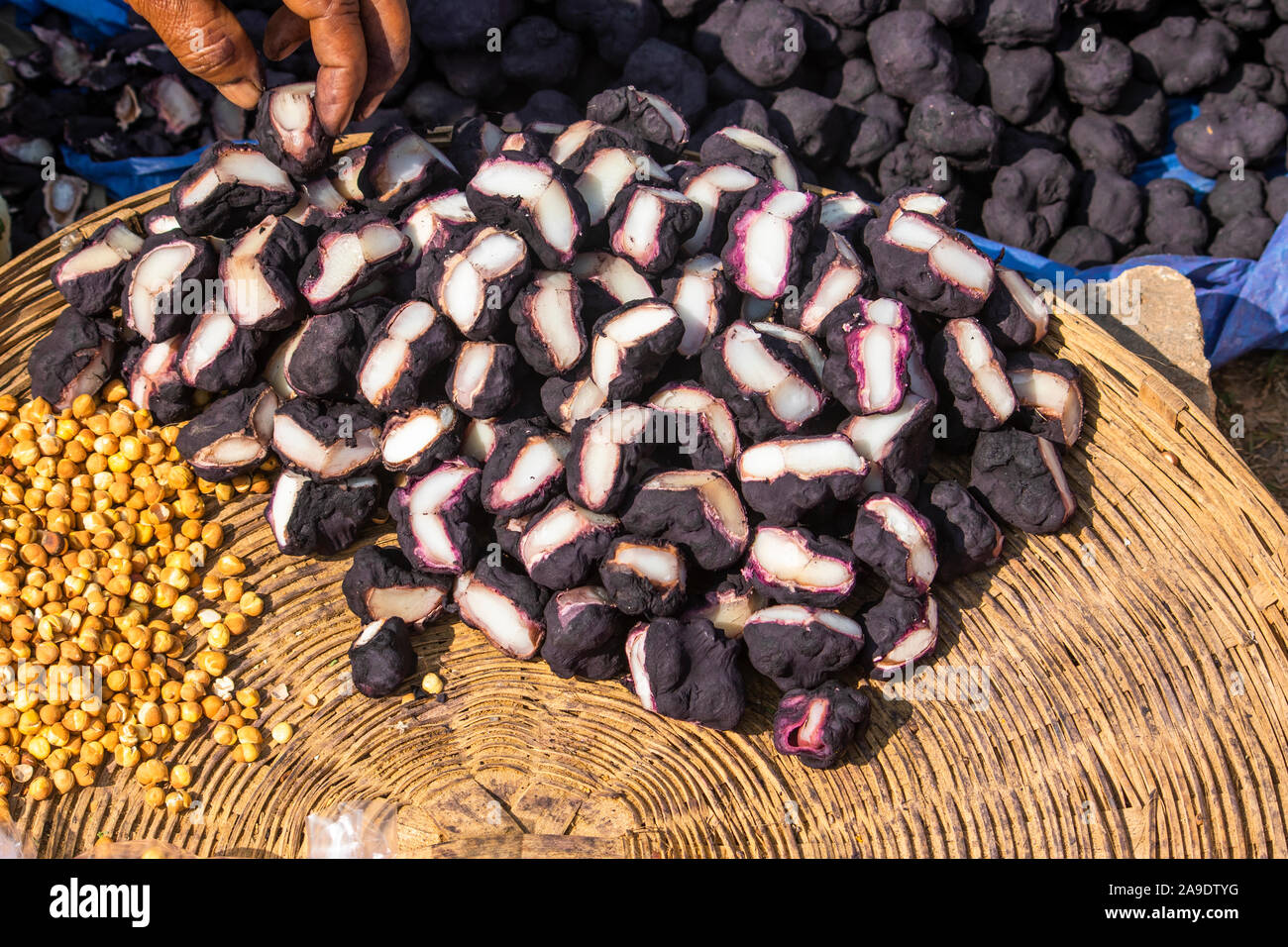 water chestnut stacked for sale in market in india Stock Photo