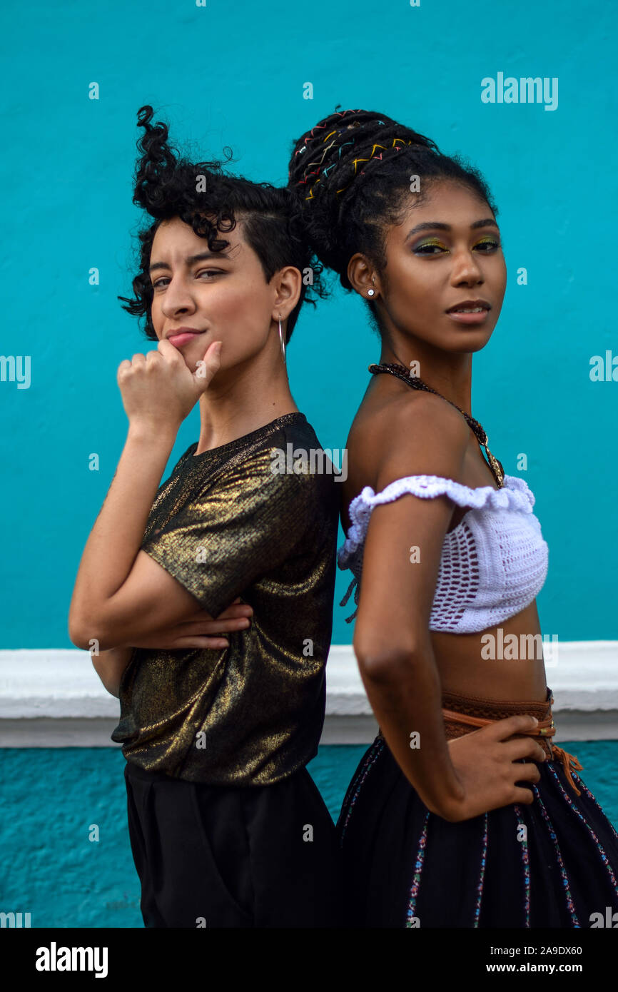 Two latin young women in the streets of Cali, Colombia Stock Photo