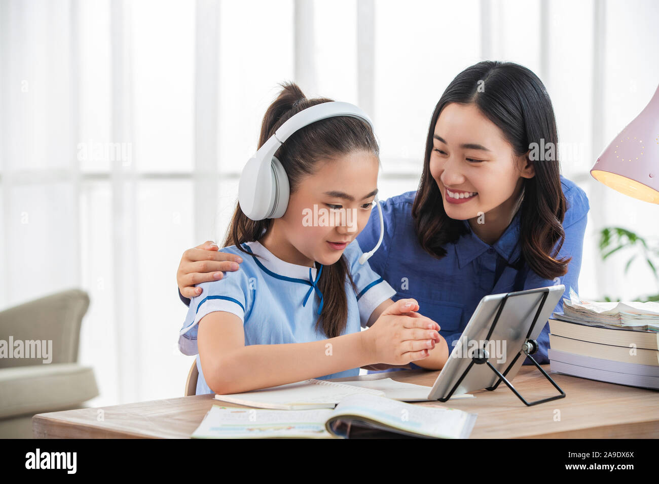 The teacher and students one-on-one online education Stock Photo